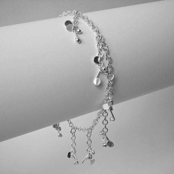 Accent charm Bracelet, polished silver by Fiona DeMarco