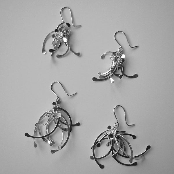Contour Cluster dangling Earrings and Contour Cluster multi dangling Earrings, polished silver by Fiona DeMarco