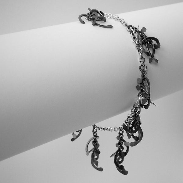 Contour charm Bracelet, oxidised silver by Fiona DeMarco