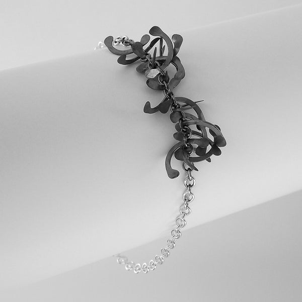 Contour semi Bracelet, oxidised silver by Fiona DeMarco