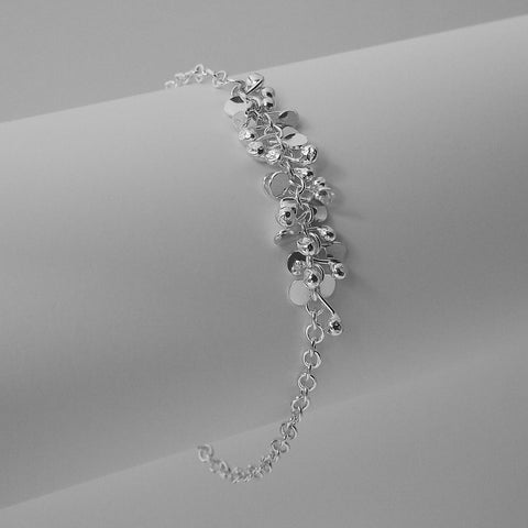 Harmony semi Bracelet, polished silver by Fiona DeMarco
