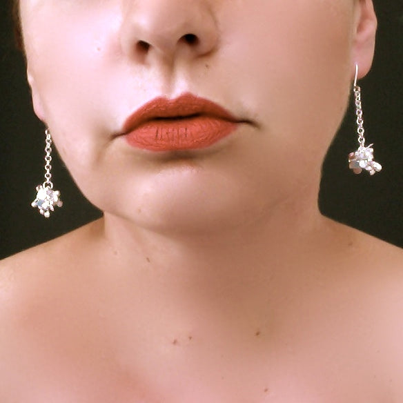 Radiance dangling Earrings, polished silver by Fiona DeMarco