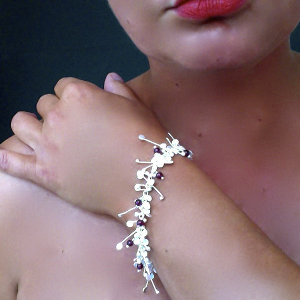 Blossom & Bloom Bracelet with garnet, satin silver by Fiona DeMarco