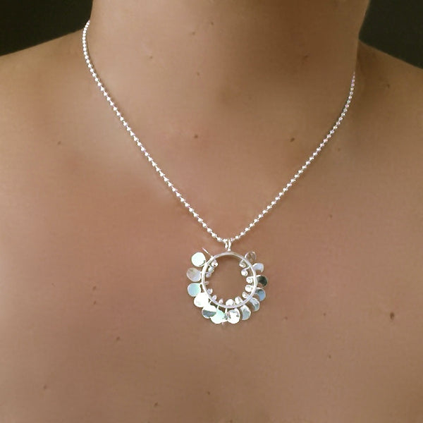 Icon Pendant, polished silver by Fiona DeMarco