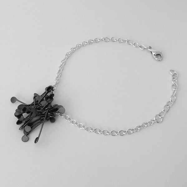 Signature Cluster Bracelet, oxidised silver by Fiona DeMarco