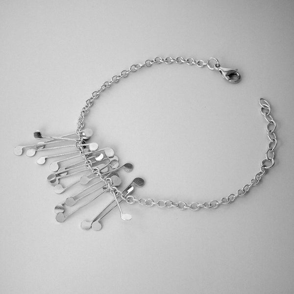Signature semi Bracelet, polished silver by Fiona DeMarco