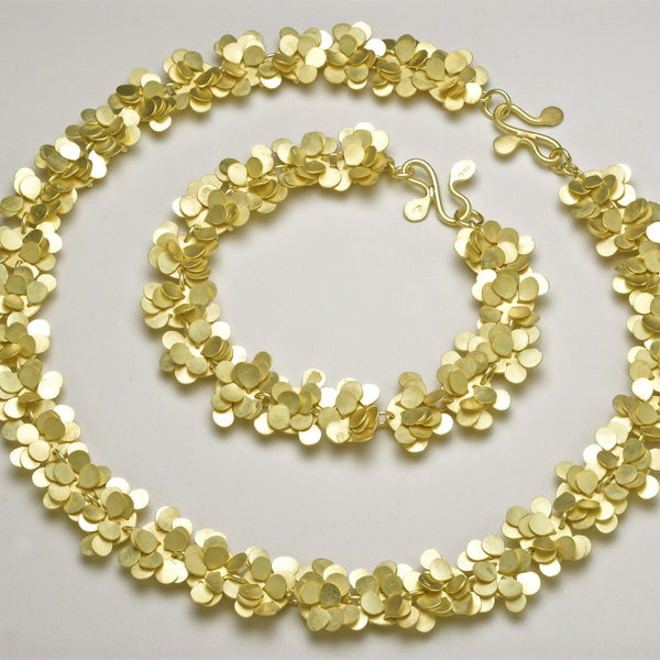 Symphony Precious Necklace and Bracelet, 18ct yellow gold satin by Fiona DeMarco