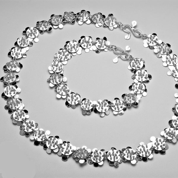 Symphony Bracelet and Necklace reverse side, polished silver by Fiona DeMarco