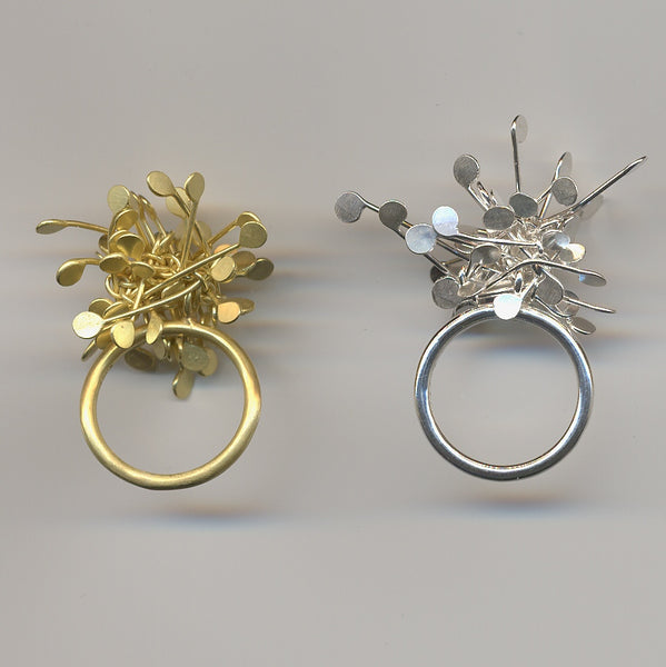 Signature Cluster rings, gold and silver by Fiona DeMarco