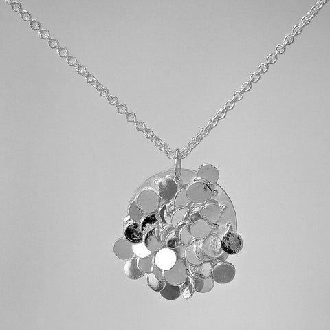 Symphony Pendant, polished silver by Fiona DeMarco