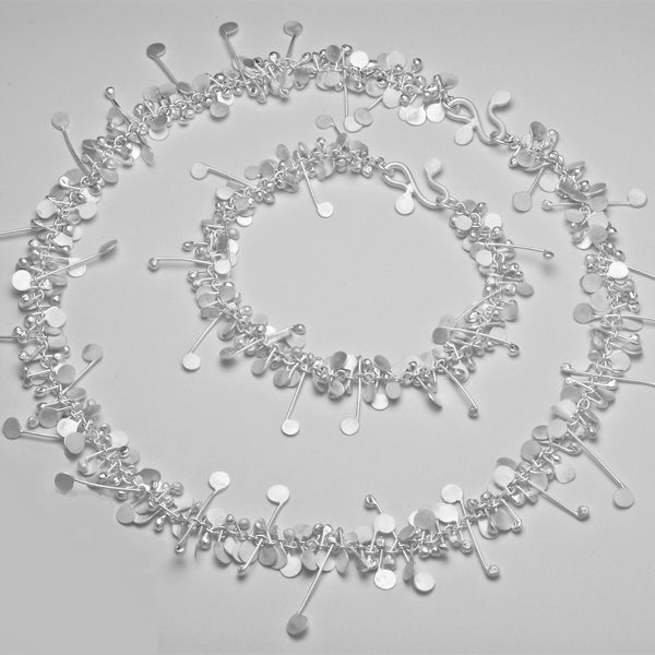 Blossom Bracelet and Necklace, satin silver by Fiona DeMarco