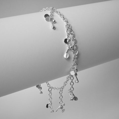 Accent charm Bracelet, polished silver by Fiona DeMarco