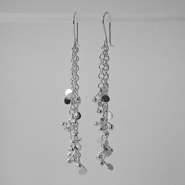Accent dangling Earrings, polished silver by Fiona DeMarco
