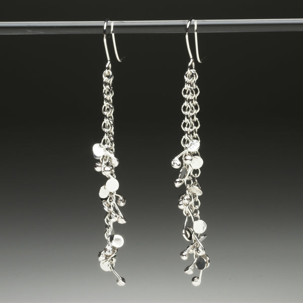 Accent dangling Earrings, polished silver by Fiona DeMarco