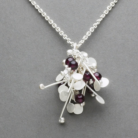 Blossom & Bloom Pendant with garnet, satin silver by Fiona DeMarco
