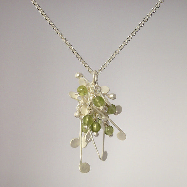 Blossom & Bloom Pendant with peridot, satin silver by Fiona DeMarco