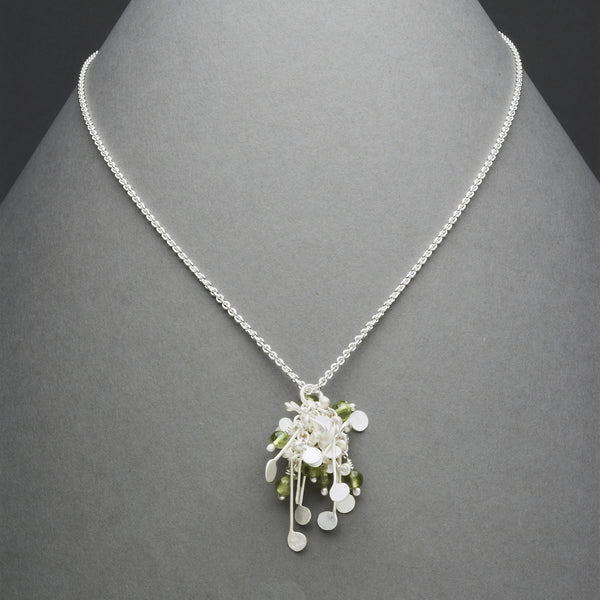 Blossom & Bloom Pendant with peridot, satin silver by Fiona DeMarco