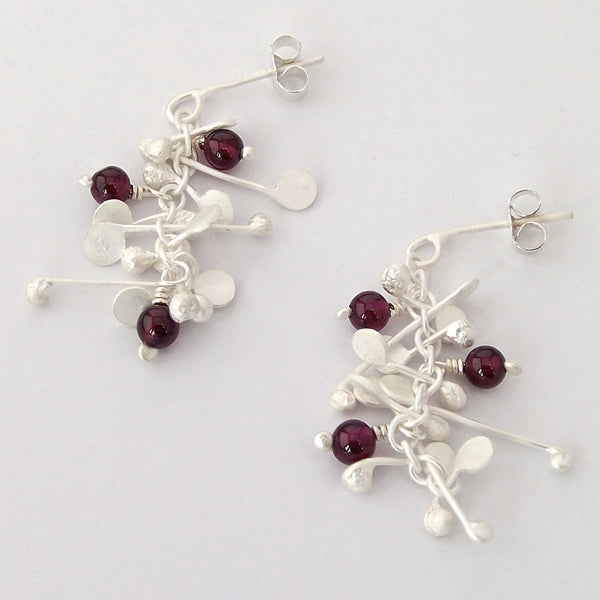 Blossom & Bloom stud Earrings with garnet, satin silver by Fiona DeMarco