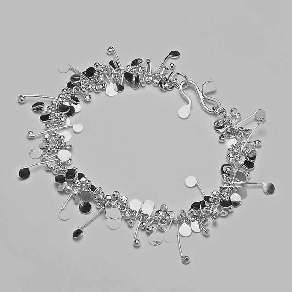Blossom Bracelet, polished silver by Fiona DeMarco