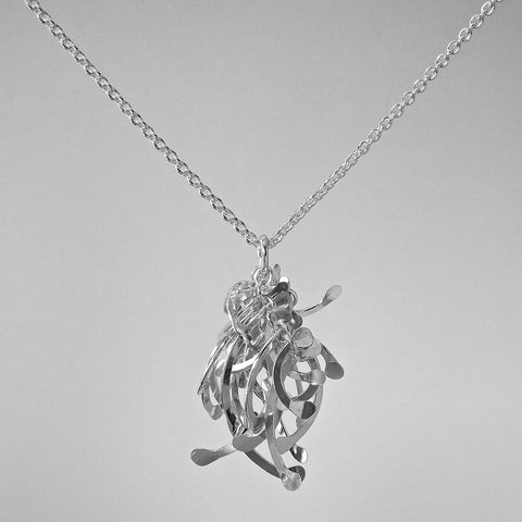 Contour Cluster Pendant, polished silver by Fiona DeMarco