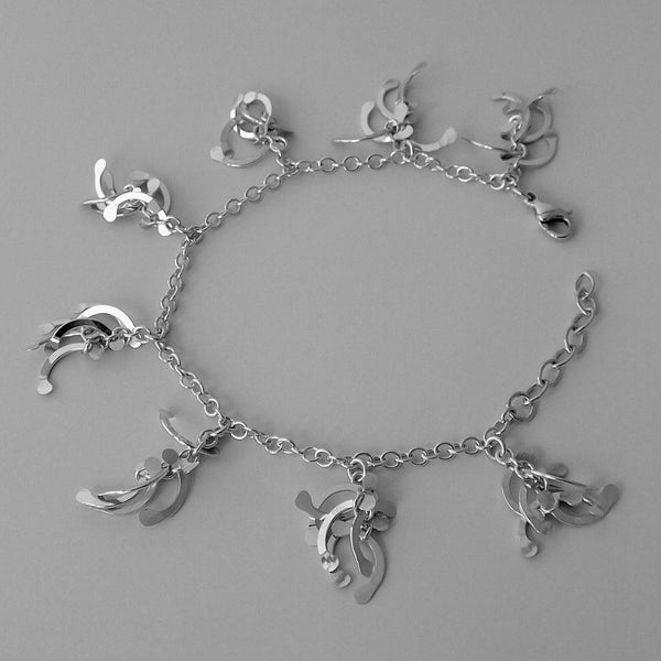 Contour charm Bracelet, polished silver by Fiona DeMarco