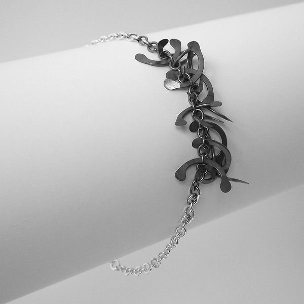 Contour semi Bracelet, oxidised silver by Fiona DeMarco