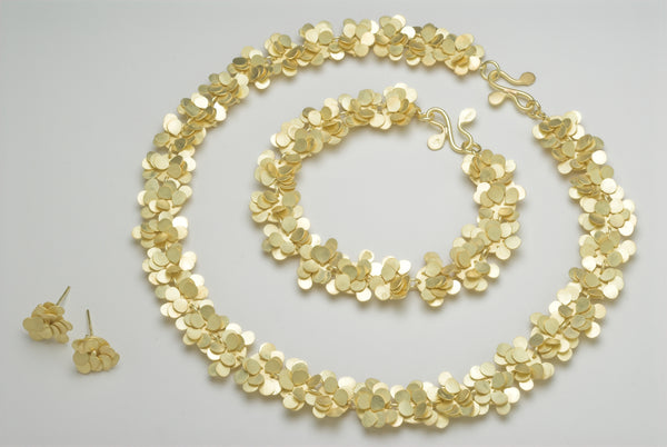 Symphony Precious collection, 18ct yellow gold satin by Fiona DeMarco