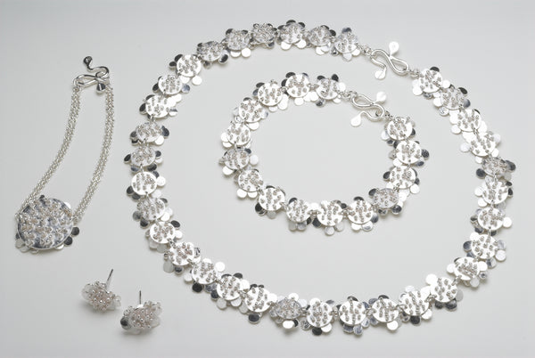 Symphony collection, reverse side, polished silver by Fiona DeMarco