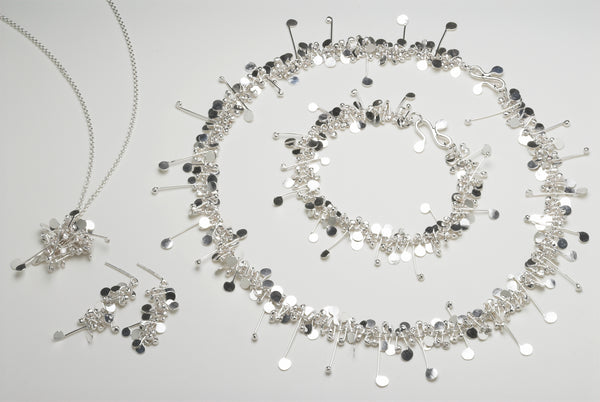 Blossom collection, polished silver by Fiona DeMarco