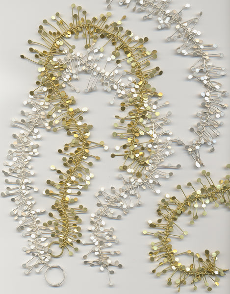 Signature necklaces, gold and silver satin by Fiona DeMarco