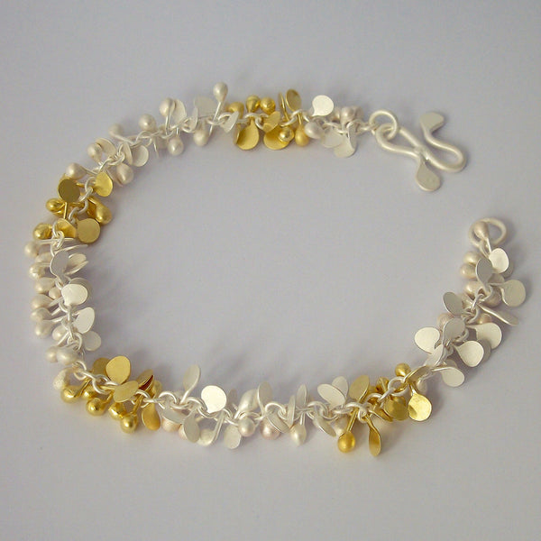 Harmony duo bracelet, 18ct yellow gold and silver, satin by Fiona DeMarco