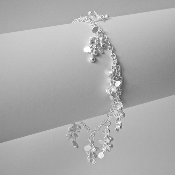 Harmony charm Bracelet, satin silver by Fiona DeMarco