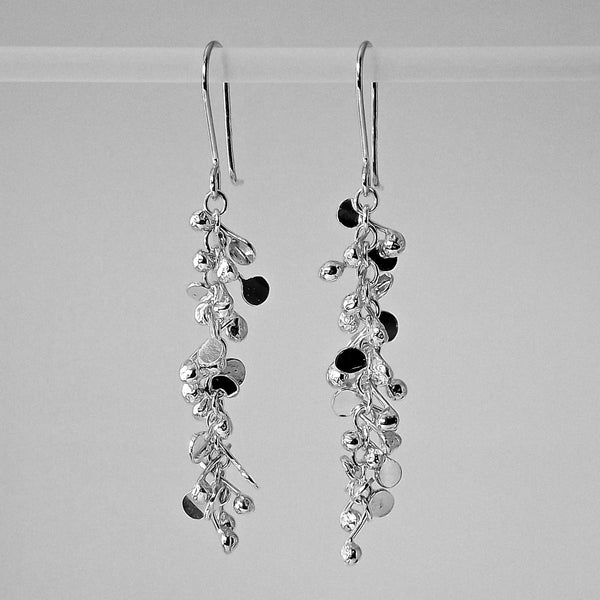 Harmony dangling Earrings, polished silver by Fiona DeMarco