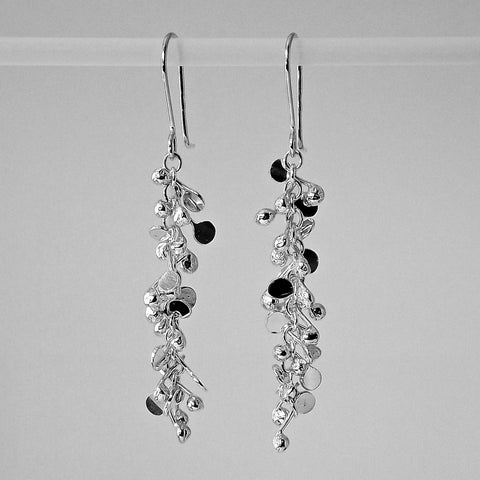 Harmony dangling Earrings, polished silver by Fiona DeMarco