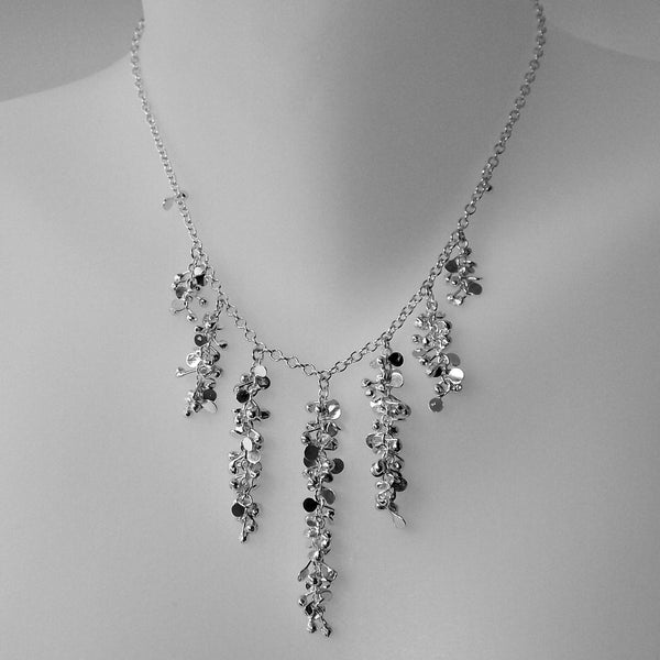 Harmony semi graduated Necklace, polished silver by Fiona DeMarco