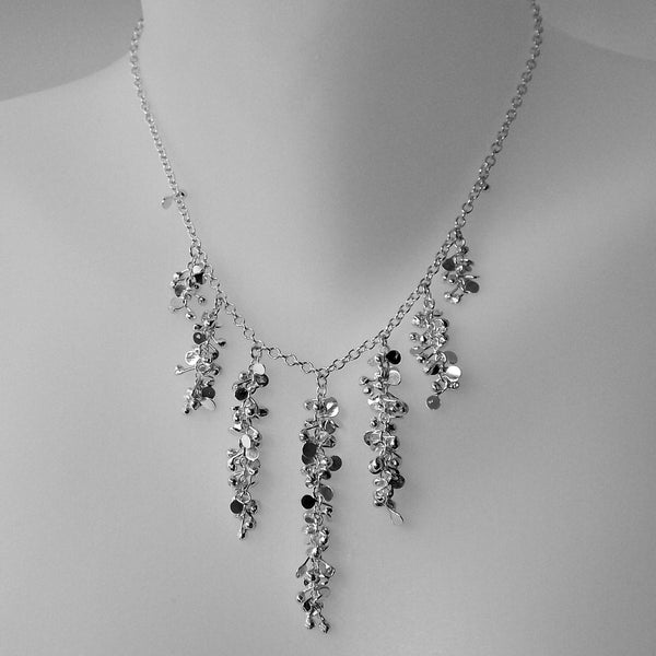 Harmony semi graduated Necklace, polished silver by Fiona DeMarco