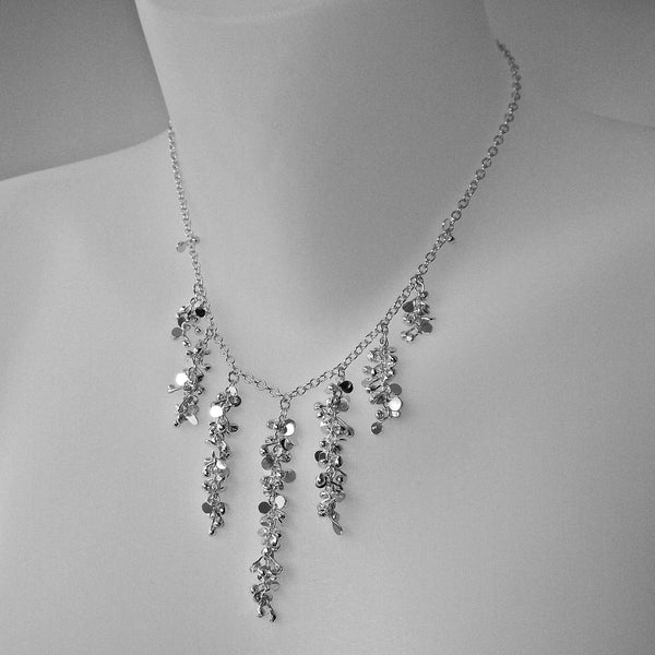 Harmony semi graduated Necklace, polished silver by Fiona DeMarco