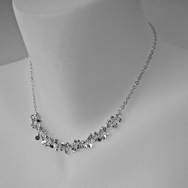 Harmony semi Necklace, polished silver by Fiona DeMarco