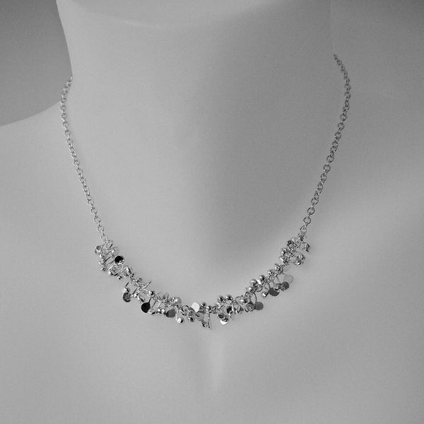 Harmony semi Necklace, polished silver by Fiona DeMarco