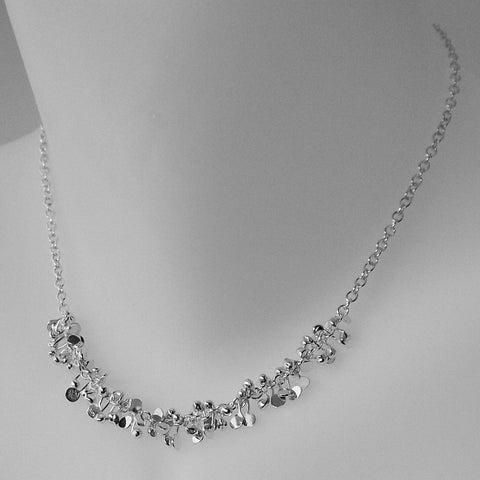 Harmony semi Necklace, polished silver by Fiona DeMarco
