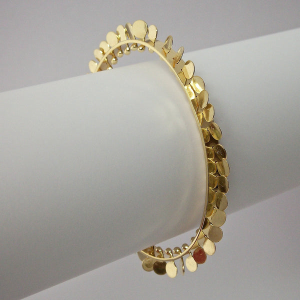 Icon Precious Bangle, 18ct yellow gold polished by Fiona DeMarco