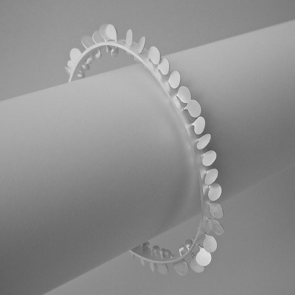 Icon Bangle, satin silver by Fiona DeMarco