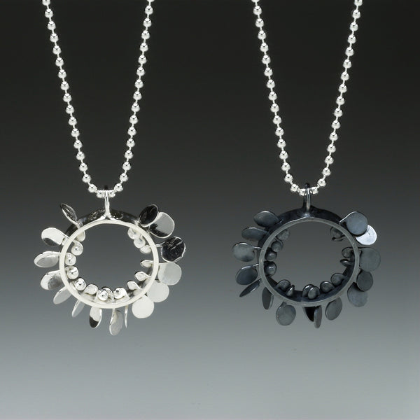 Icon Pendants, polished and oxidised silver by Fiona DeMarco
