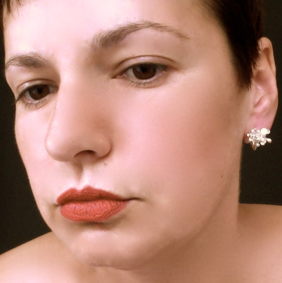 Radiance stud Earrings, polished silver by Fiona DeMarco