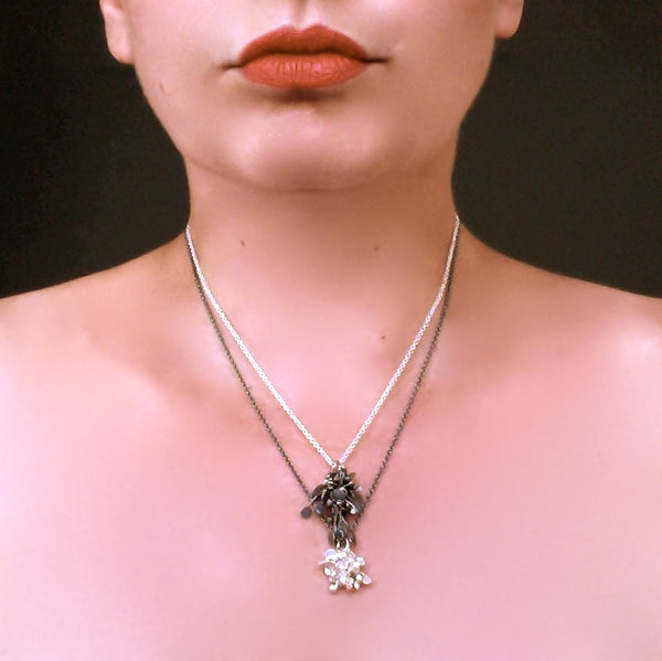 Radiance Pendant and Blossom Pendant, silver and oxidised silver by Fiona DeMarco