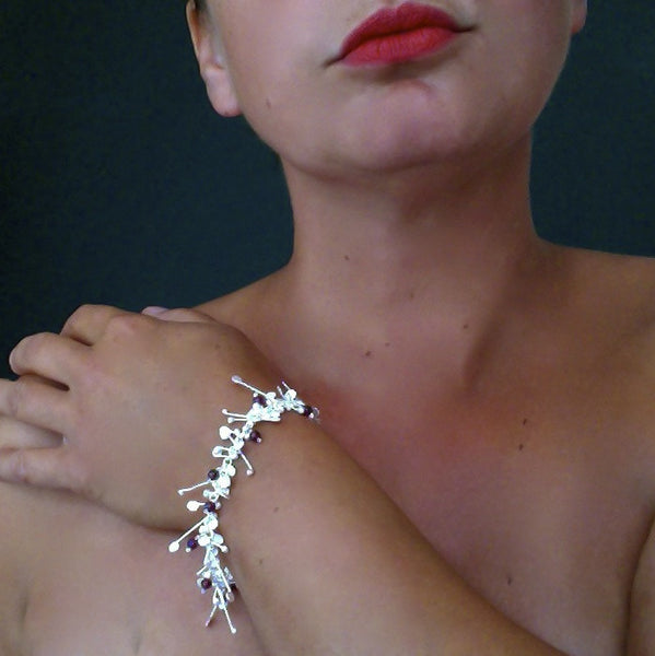 Blossom & Bloom Bracelet with garnet, satin silver by Fiona DeMarco