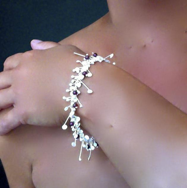 Blossom & Bloom Bracelet with garnet, satin silver by Fiona DeMarco