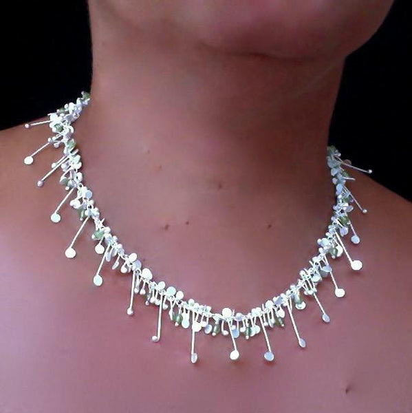 Blossom & Bloom Necklace with peridot, satin silver by Fiona DeMarco