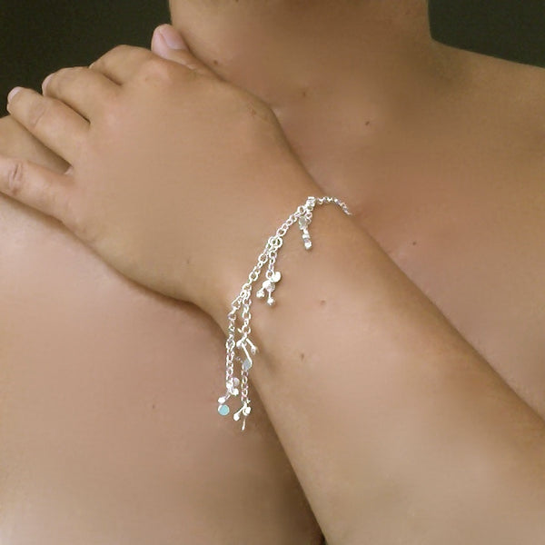 Accent charm Bracelet, polished silver by Fiona DeMarco