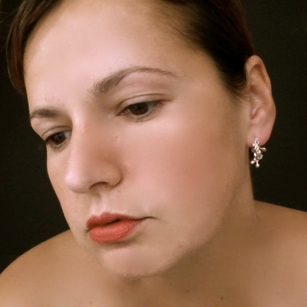 Harmony stud Earrings, polished silver by Fiona DeMarco